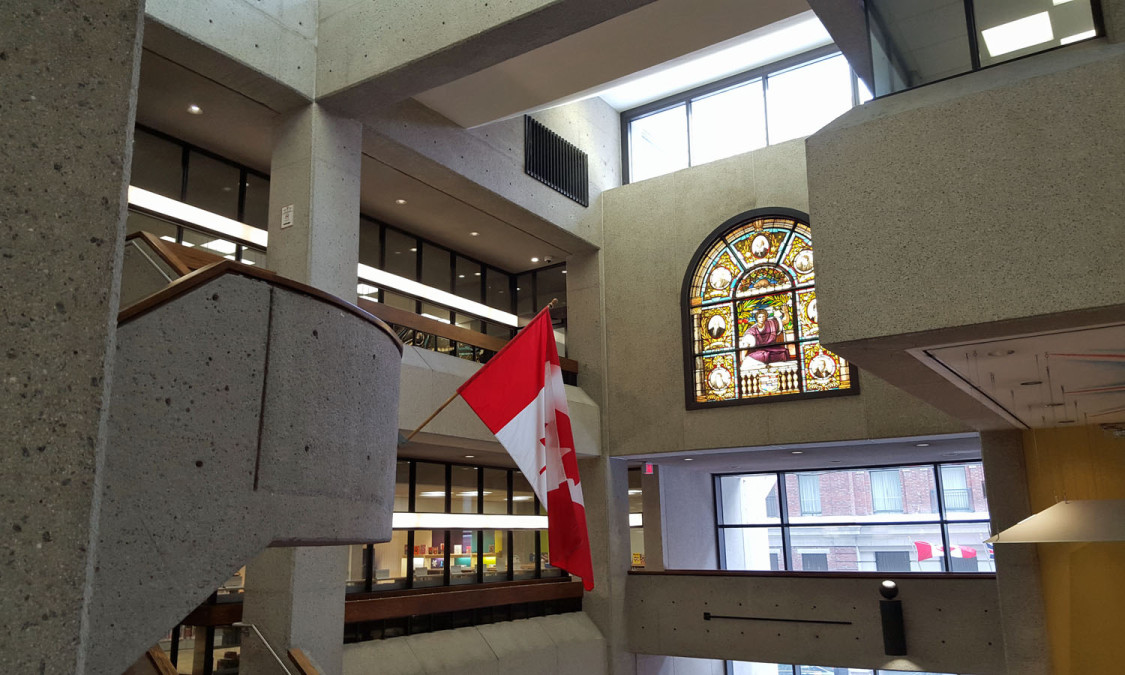 The atrium from the stair highlighting a stained glass window retained from the previous Carnegie Library