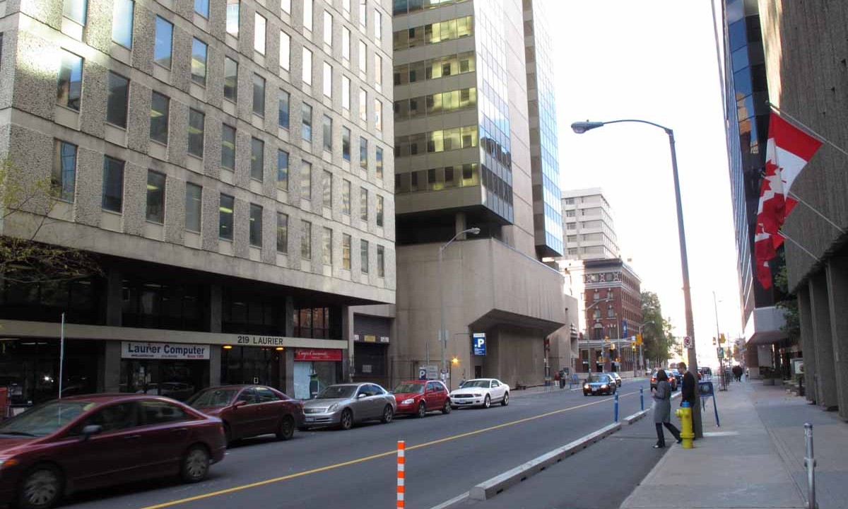 Looking east along Laurier Avenue with library in context