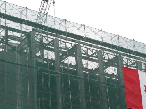 Detail of top of of building with exposed structure