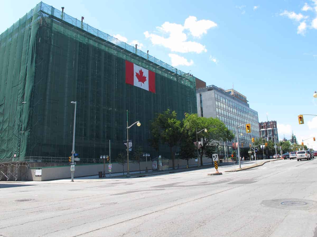 Looking north at west side of Elgin Street with Lorne Building demolition in foreground and British High Commission beyond