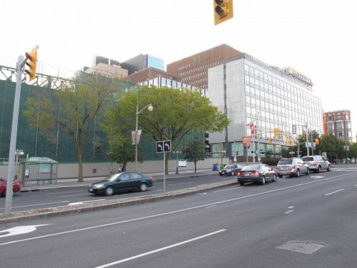 Looking north on Elgin with remains of Lorne Building south of the Modernist British High Commission