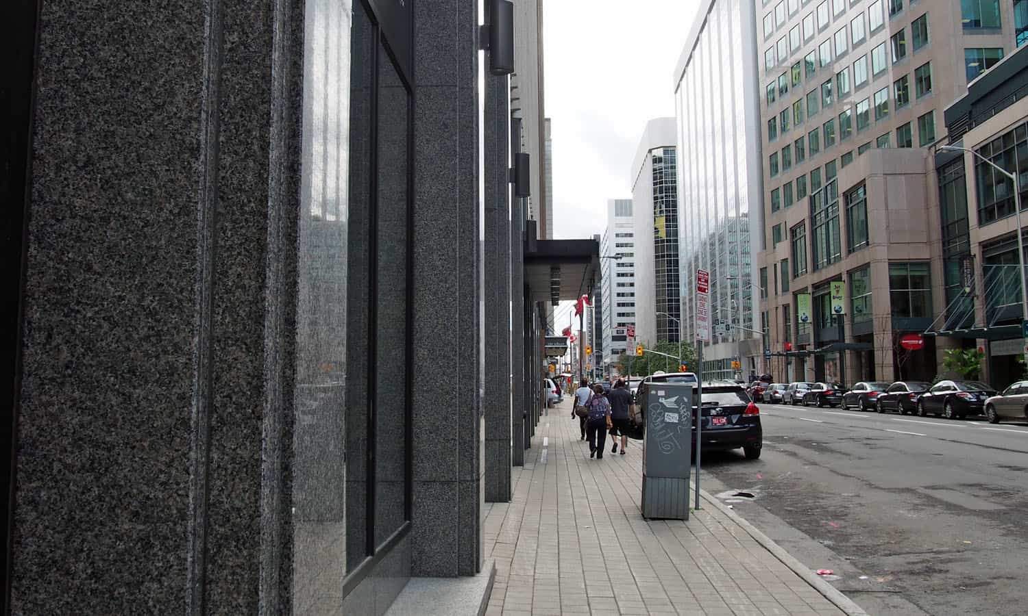 Sidewalk edge along Albert Street with its two entries