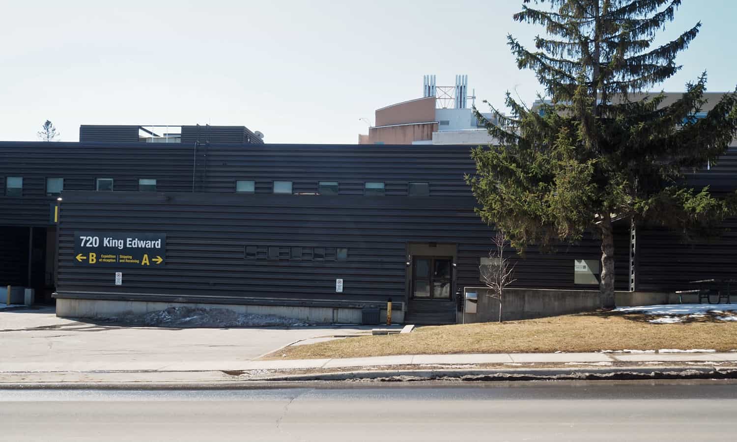 North end of the building along King Edward Avenue highlighting the ribbed metal cladding